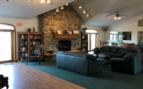 Gateway clubhouse interior by fireplace